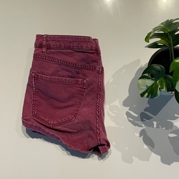 H&M maroon jean shorts with small rips, size 6. - Picture 2 of 3
